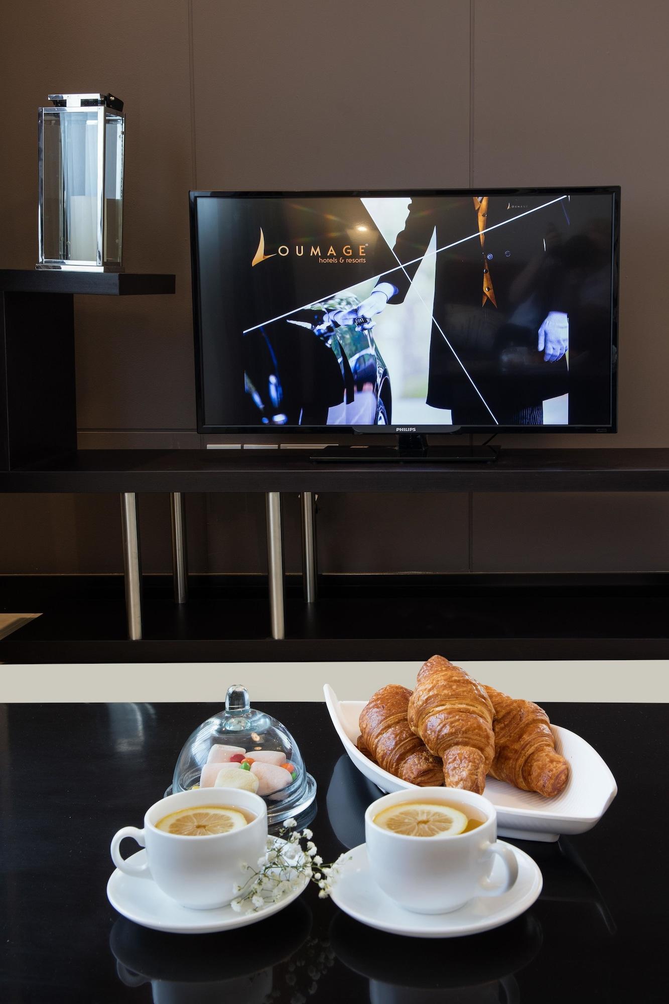 מנאמה Loumage Suites And Spa מראה חיצוני תמונה
