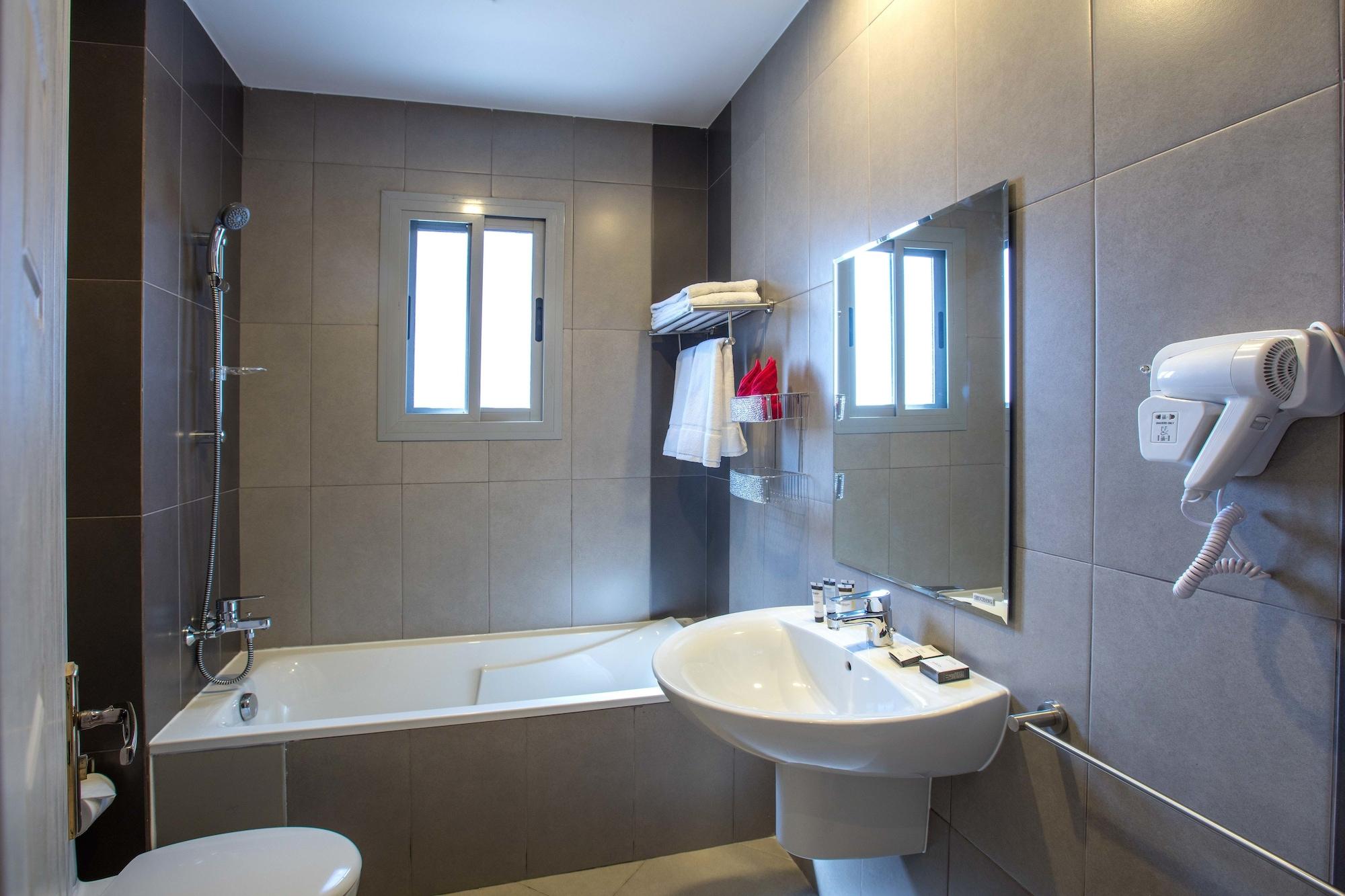 מנאמה Loumage Suites And Spa מראה חיצוני תמונה