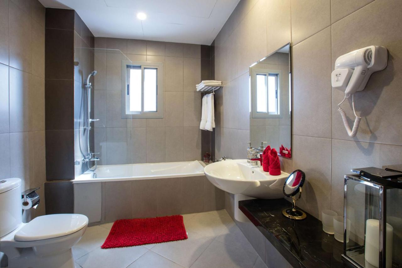 מנאמה Loumage Suites And Spa מראה חיצוני תמונה