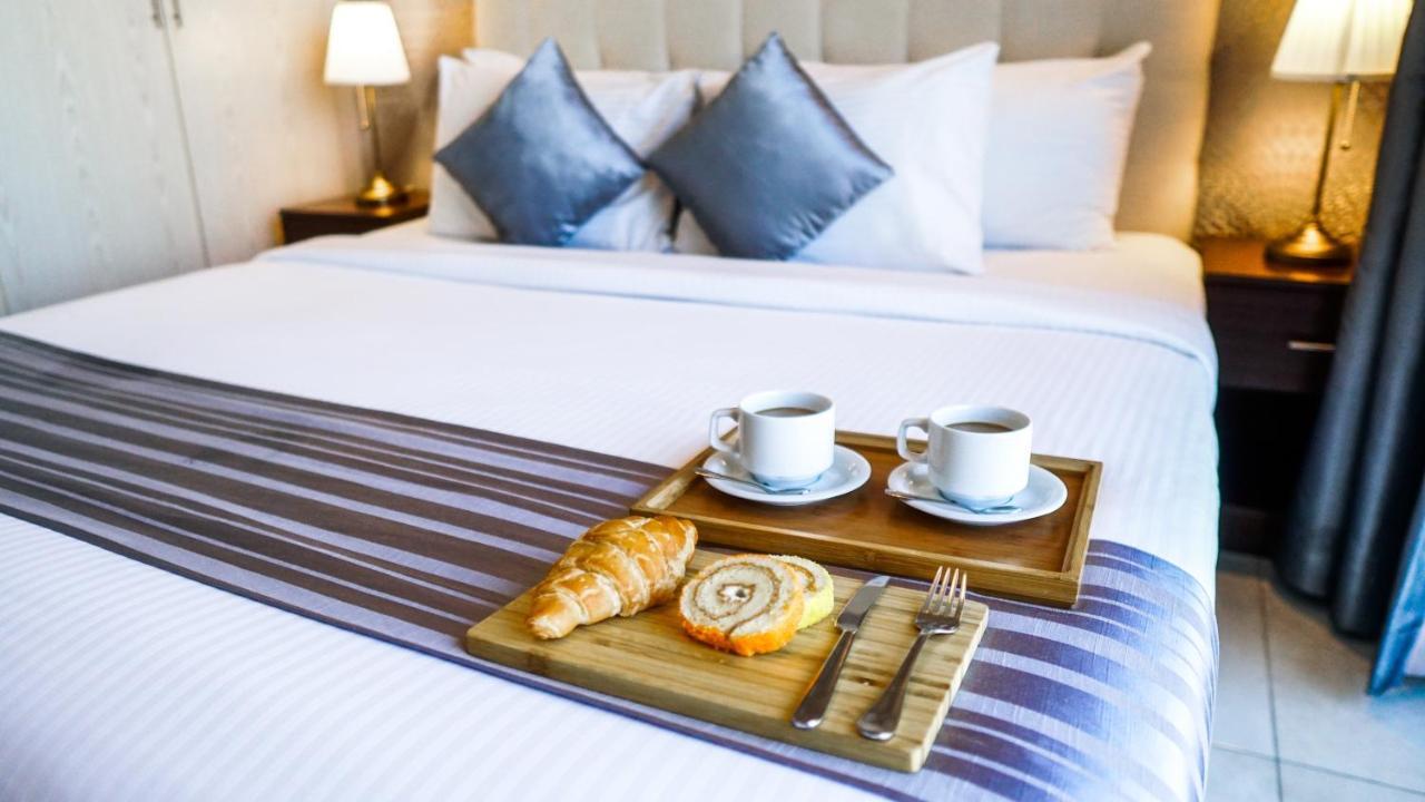 מנאמה Loumage Suites And Spa מראה חיצוני תמונה