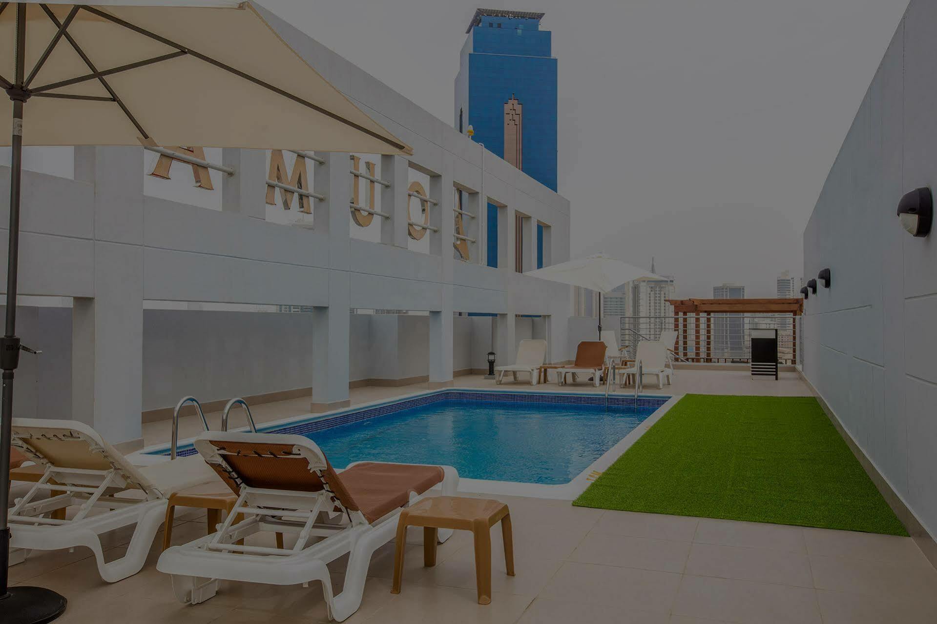 מנאמה Loumage Suites And Spa מראה חיצוני תמונה